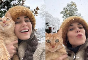 Cansu Dere kedisiyle birlikte kar keyfi yaptı