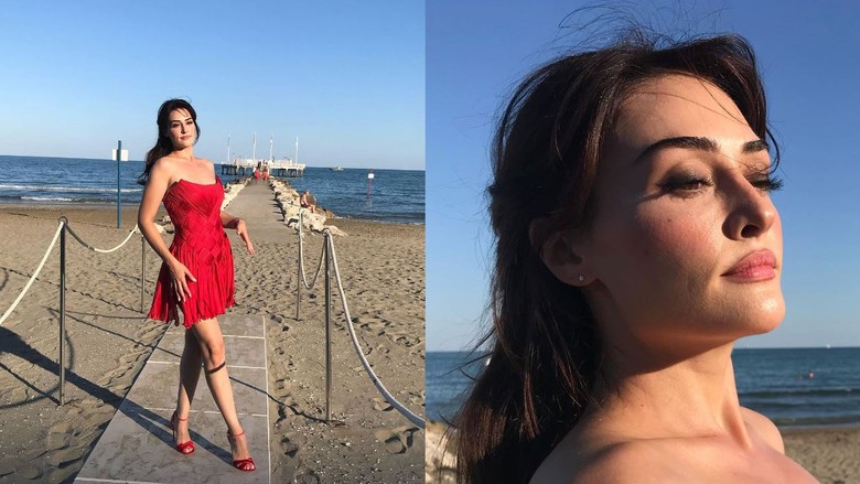 Esra Bilgiç, Venedik'te kırmızı elbisesi ile poz verdi